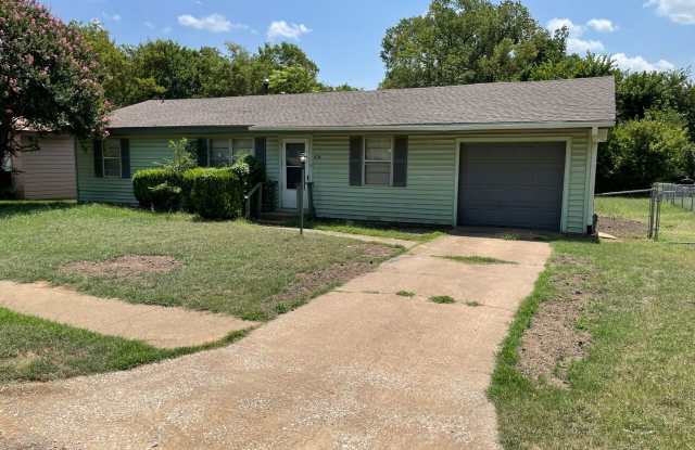 This 3 bedroom, 1.5 bathrooms house sits on a large lot with a great fenced in back yard! - 404 West Heron Street, Denison, TX 75020