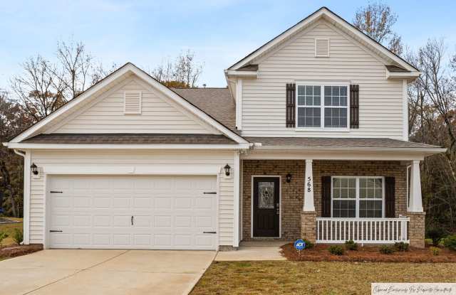 EXECUTIVE HOME IN IRMO'S STONEMONT WITH TWO PRIMARY SUITES photos photos