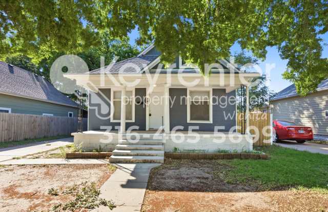 Charming 2-Bedroom Home with Detached Garage & Fenced Yard Gallery 1
