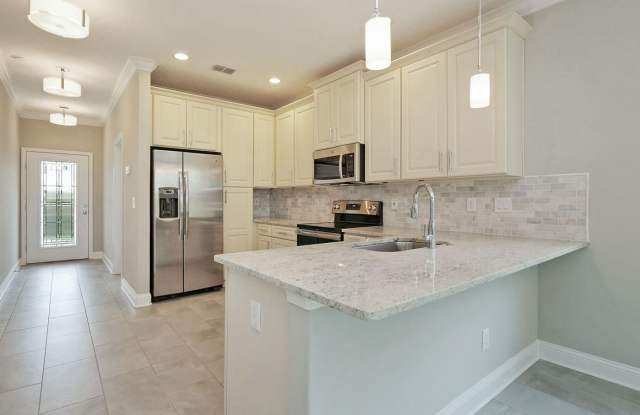4 Bedroom 3.5 bath Beauty in Just a Short Stroll to Jax Beach - Garage, Lawncare Included & Fenced in Back Yard! photos photos