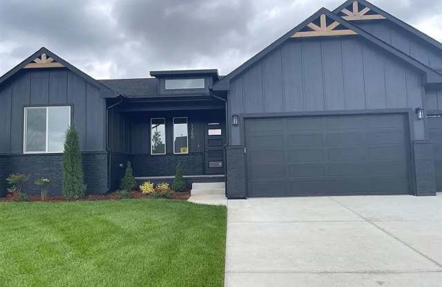 Single family home in Goddard Kansas. This home features 2 bedrooms, 2 bathrooms and a three car garage. photos photos