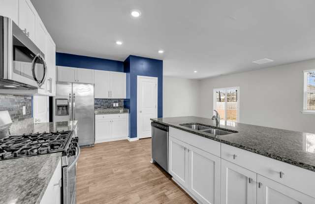 Well-Maintained 4-Bedroom Home in a Quiet Neighborhood | 550 Wayton photos photos