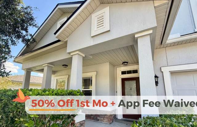 Discover this stunning 4-bedroom, 2.5-bath home in Stirling Bridge at Aberdeen - 105 North Aberdeenshire Drive, St Johns, FL 32259