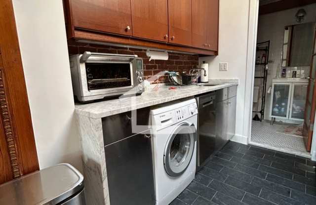 Huge penthouse unit with in unit laundry in prime location near BU! photos photos