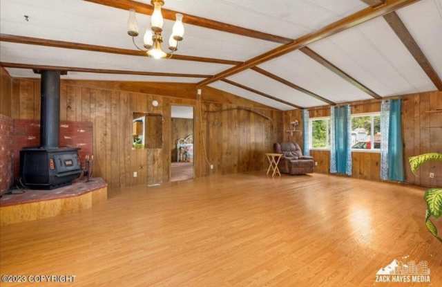 Rare Find! Spacious East Anchorage Home with Large Yard - Close to Base Access! photos photos