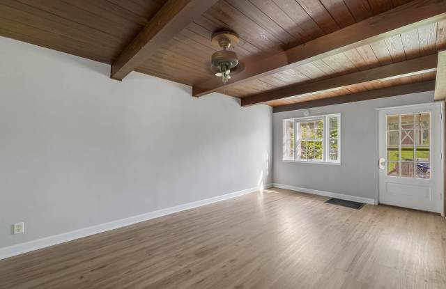 Home-Like Living with Sunroom, Attached Garage & In-Unit Laundry Gallery 3