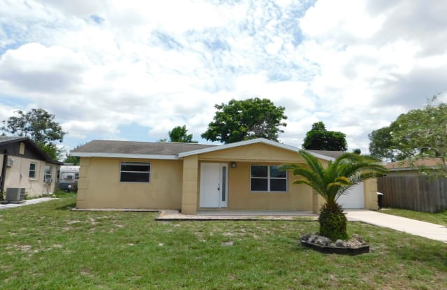 7034 Westcott Dr - 7034 Westcott Drive, Jasmine Estates, FL 34668