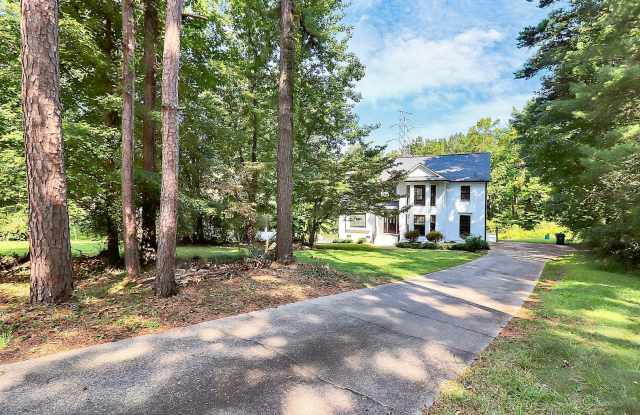 Nestled in a quiet, established Matthews neighborhood, this beautifully updated home sits on a spacious lot, offering both comfort  style. photos photos
