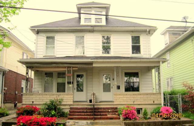 Quiet Wilson home with newer kitchen, off-street parking, laundry, yard photos photos