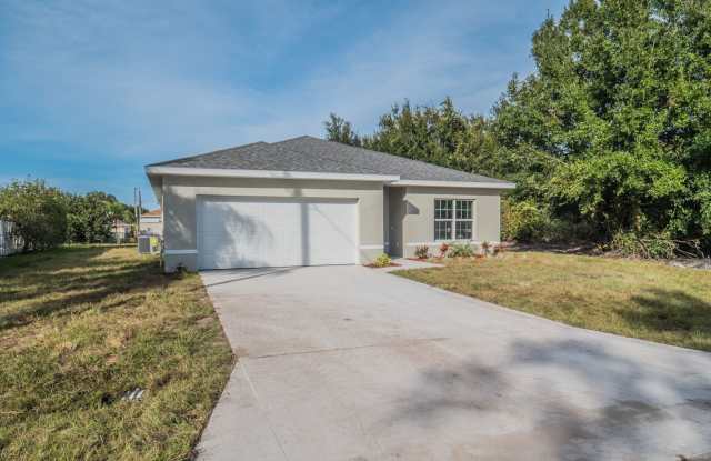 Practically New  Packed with Upgrades – A Must-See 4-Bedroom Gem in Poinciana! photos photos