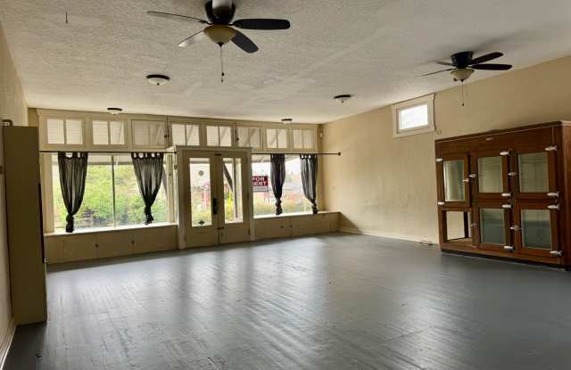 Rare opportunity to lease a versatile mixed-use property in the heart of Milwaukie! photos photos