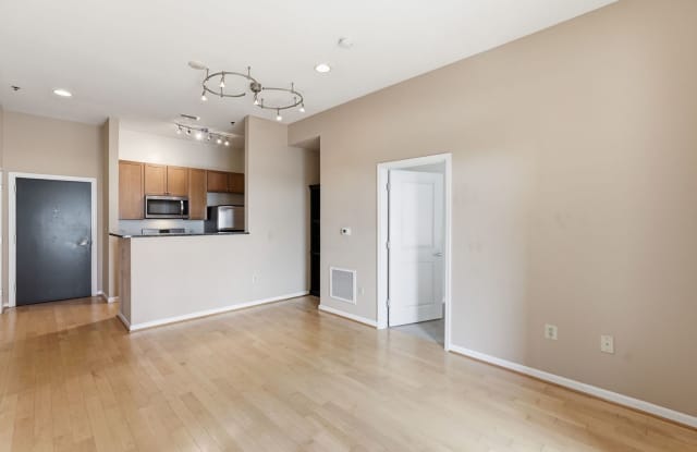 Experience elevated city living in this beautifully maintained residence ideally situated in the heart of it all. Gallery 4