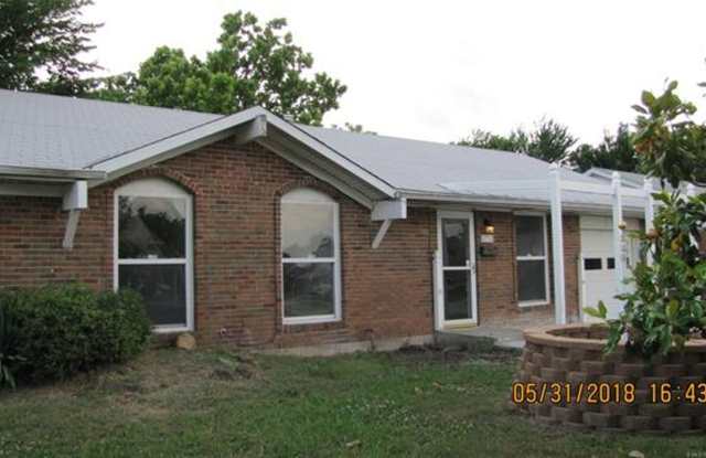 Charming full-brick 3-bedroom, 1.5-bath home featuring durable luxury vinyl plank flooring and tile throughout, along with fresh interior paint. photos photos