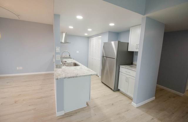 Updated 2BR Condo Steps from Mayo + Underground Parking Gallery 1