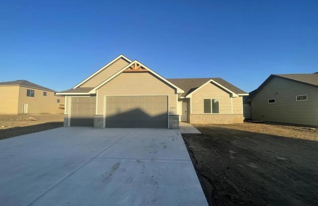 Single family slab home with three car garage. This home is 4 bedrooms, three bathrooms open floor plan. Zero entry home. Mowing included. photos photos