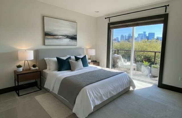 Stunning 2 Bed, 2 Bath Townhouse with Breathtaking Views! Steps away vibrant shops, restaurants, and the Seattle Center! photos photos