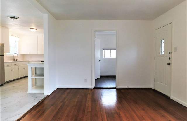 Available NOW!!!! Gorgeous 1 story, 4 bedroom, 1 bath home with a fenced yard and storage building in the backyard. This home has wood look flooring in the bedrooms, hall and family room. Tile flooring in the kitchen, dining, laundry and bathroom. Gorgeou Gallery 4