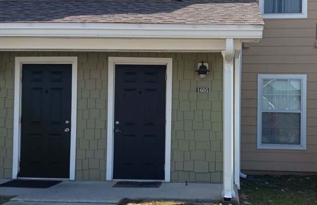 Beautiful Townhome in the Gated Community of Nautilus Cove! *Water/Sewer, Garbage  Lawncare Included!* *1/2 OFF Security Deposit for Active-Duty Military!!* photos photos