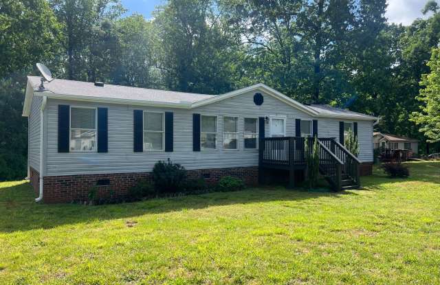 Introducing a charming 4-bedroom, 2-bathroom house in the desirable Gastonia, NC area photos photos