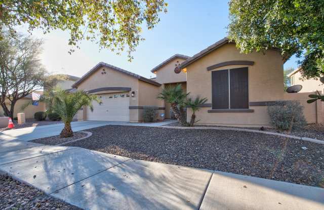 Wonderful home available April 1st!!  Split bedrooms, High Ceilings, Cozy yard with brick area and grass!! Close to Luke Air force base!!! Gallery 1