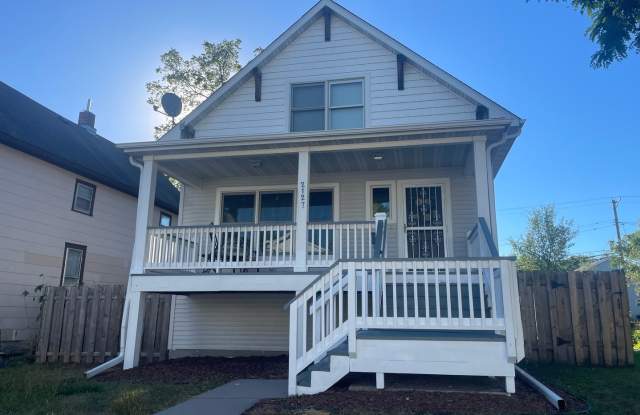 Free Parking! Two Car Garage - Updated Three Bedroom Home W/ Fenced-In Backyard photos photos