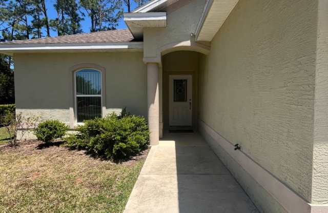 Charming 3 bedroom, 2 bathroom dulplex located in the desirable Palm Coast! photos photos