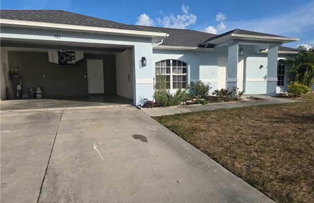301 SW 14th Place - 301 Southwest 14th Place, Cape Coral, FL 33991
