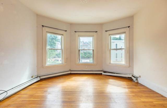 Massive 5 Bed / 2 Bath Duplex in Mission Hill — 2,000 Sq Ft, In-Unit Laundry, Updated Kitchen, Prime Student Location photos photos