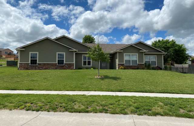 FENCED BACKYARD! BONUS ROOM/OFFICE! SAFE ROOM! THREE CAR GARAGE - 205 Highland Grove Drive, Manhattan, KS 66503