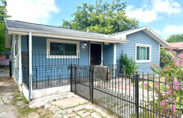 Charming 2-Bedroom Home with Flex Room & Gated Entry Gallery 1