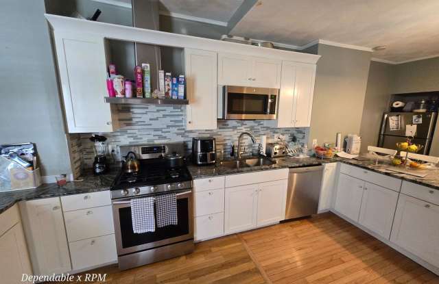 Spacious Three-Level Boston Rental with Flexible Living Space photos photos