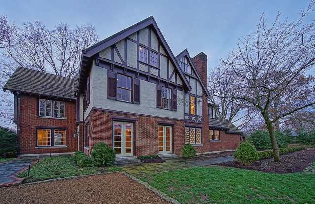 Stunning Tudor-style 4BR/3.5BA home in a prime, unbeatable location! photos photos