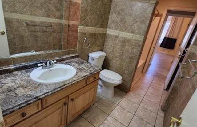 Great 4-Bedroom Home with 3-Car Garage and Large Backyard Gallery 4