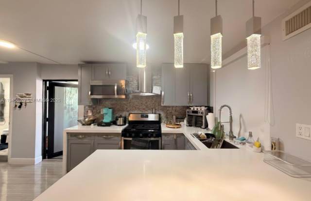 10417 NW 129th St - 10417 Northwest 129th Street, Hialeah Gardens, FL 33018