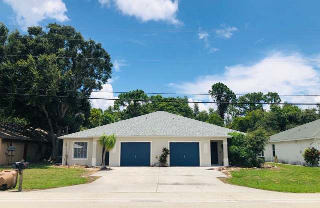 Experience this Cape Coral 3 bedroom 2 bath duplex with 1 car garage and screened in lanai. photos photos