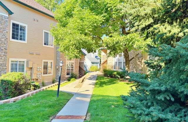 NEW Paint  Carpet in this Fantastic 2 Bed 2 Bath Condo in Meadow Hills V Cheery Creek Schools!! - 4079 South Crystal Circle, Aurora, CO 80014