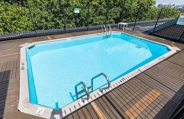 Modern 2-bed, 1.5-bath condo on the 4th floor of The Amory House photos photos