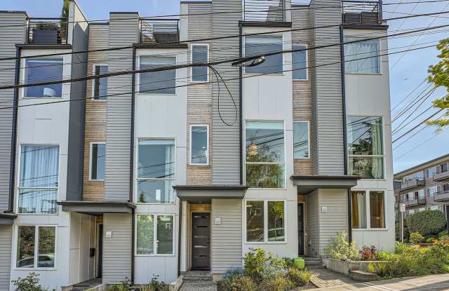 Modern stylings and cutting-edge conveniences meet in this spectacular Queen Anne hillside location! photos photos