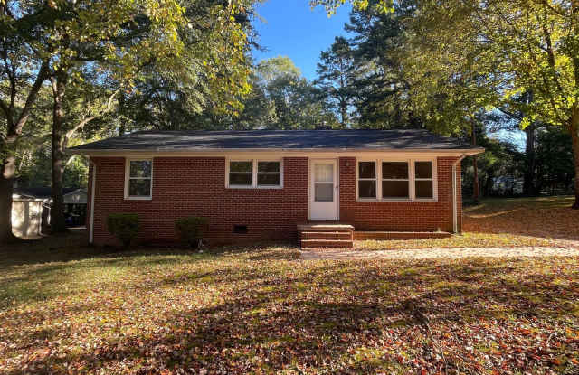 3bed 1.5 bath Brick Ranch- Freshly painted- Hardwood Floors- Carport- Storage Shed!!! Gallery 1