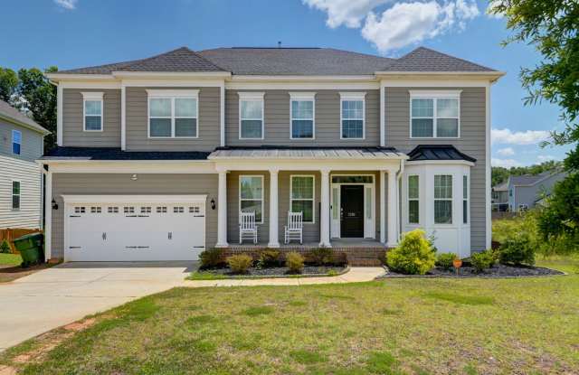 Welcome to 2286 Harvestwood Lane, a luxurious 5-bedroom, 4.5-bath home nestled in the serene community of Chapin! photos photos