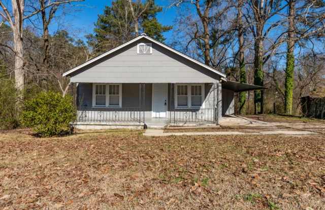 Cozy 2BR Home with Modern Amenities & Inviting Front Porch! Gallery 1