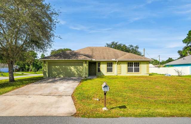 Spacious Palm Bay Home with Vaulted Ceilings & Screened-In Porch Gallery 1