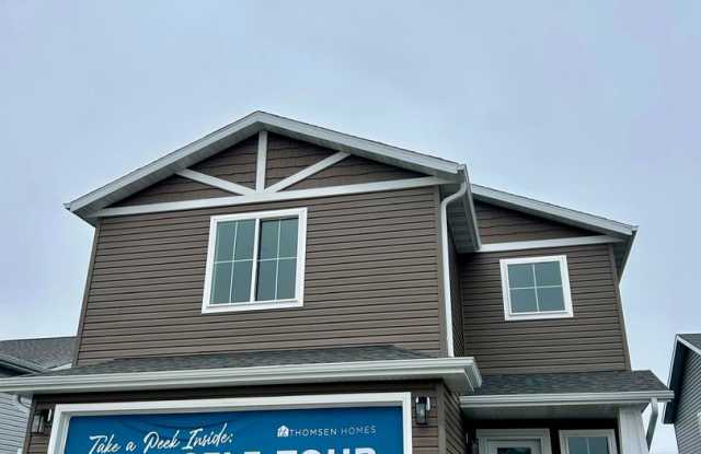 Spacious  Stylish 3-Bed Home with Modern Finishes and Attached 2-Stall Garage photos photos