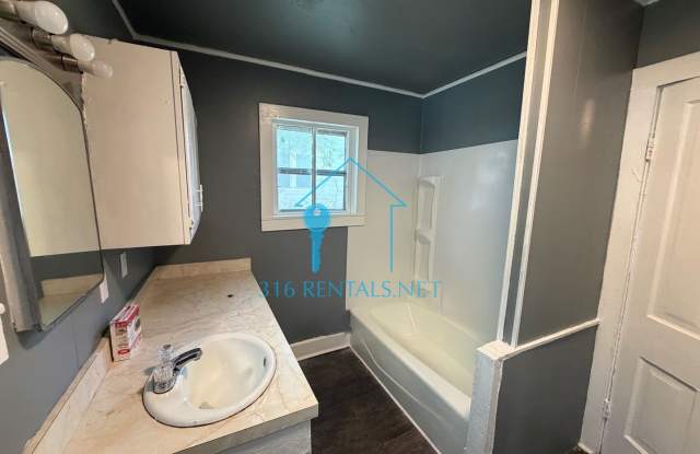 NOVEMBER RENT FREE | $775 2BR House w/ Front Porch & Huge Shaded Yard | Newton Gallery 4