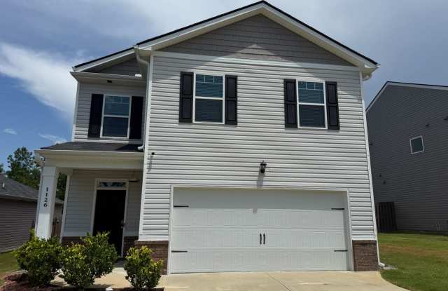 Open concept 4 bed, 2.5 bath home with fenced yard and garage photos photos