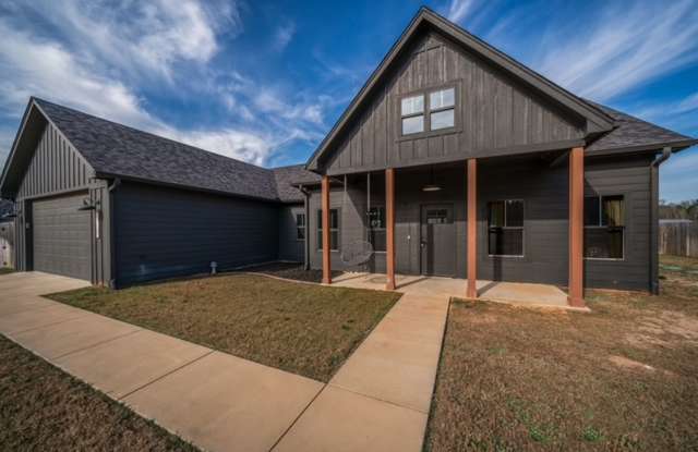 STUNNING modern farmhouse built in 2022 on 1 acre just outside the city limits of Tyler! photos photos