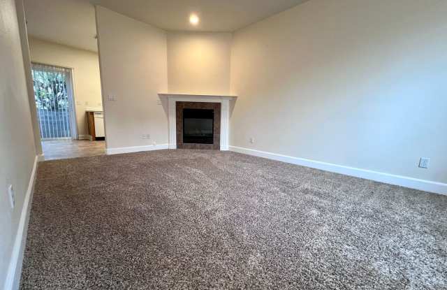 MOVE-IN SPECIAL – 1/2 Off First Month’s Rent! Charming 3-Bedroom End-Unit Townhome with Attached Garage & Private Yard! Gallery 3