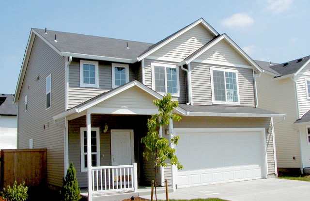 Spacious 4 Bedroom Home w/ Upstairs Laundry & Fully Fenced Yard! photos photos