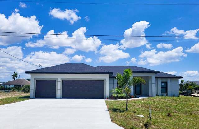 New construction home offering 4 bedrooms 2 baths large covered screen lanai 3 car garage - 341 Northwest 7th Avenue, Cape Coral, FL 33993 New construction home offering 4 bedrooms 2 baths large covered screen lanai 3 car garage - 341 Northwest 7th Avenue, Cape Coral, FL 33993