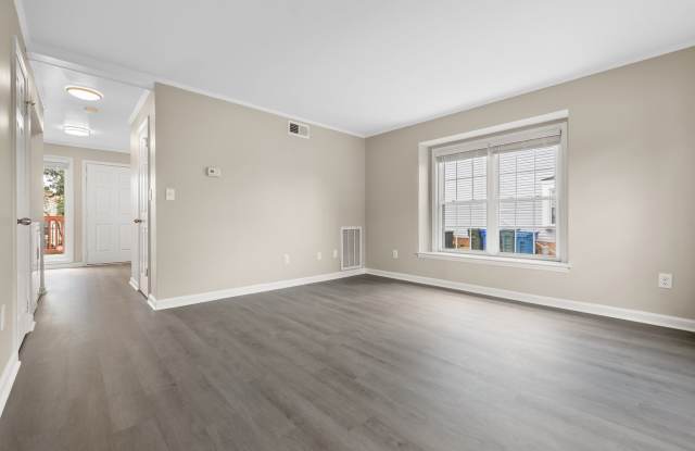 Discover this freshly renovated end-unit townhome in Durham, NC featuring 2 bedrooms and 1.5 baths. Gallery 3